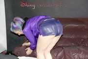 Mara wearing a sexy purple shiny nylon shorts (selfmade) and a rain jacket during preparing her sofa (Pics)