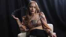 Subtle grace and cigarette smoke: irresistible confidence