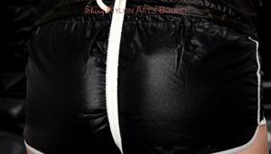 Jill tied and gagged in shiny nylon shorts