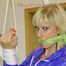 Pia tied and gagged in shiny nylon shorts