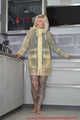 Miss Francine in yellow Schmuddelwedda raincoat