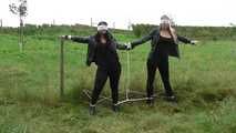 Jasmin & Larissa tied on fence Photoshoot