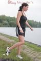 Enni outdoor wearing a sexy black shiny nylon shorts and a black top (Pics)