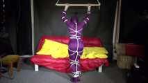 Watching sexy Sonja wearing a supersexy purple shiny nylon rainwear combination being tied and gagged overhead with ropes and a clothgag (Video)