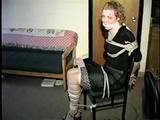 19 YEAR OLD COLLEGE STUDENT SHANA IS TIGHTLY BOUND TO A CHAIR AND HAS HER MOUTH STUFFED & CLEAVE GAGGED ON SCREEN 2 TIMES (D53-10)