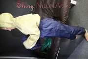 *** Watching sexy SANDRA putting on and wearing several layers of sexy shiny nylon rainwear (pics)***