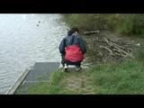 Sexy archive girl dressed with an shiny nylon adidas shorts and puts a rain pants and a rain jacket over it (Video)