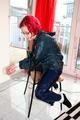 Marlin tied and gagged in a shiny blue rainsuit