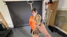 Lana bound and gagged in shiny Shorts and Windbreaker 