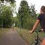 Watch Sandra riding her bike enjoying her shiny nylon shorts