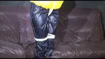 MARA tied and gagged overhead with ropes and a ballgag wearing a super sexy super shiny black rain pants, rubber boots and a yellow down jacket (Video)
