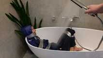 Myxxxy surprised by an Intruder in her Bathroom finally bound and gagged in Rainwear