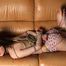 Topless barefoot Polina, hogtied on the couch