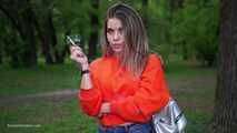Pretty Kate is smoking Marlboro Red 100s in the park
