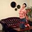 Topless and barefoot Claudia hogtied within red ropes