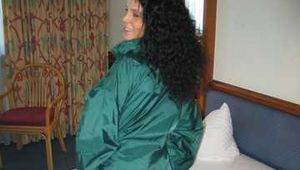 138 pics of Angelique in shiny nylon rainwear!