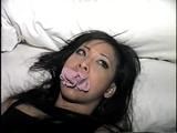 30 YR OLD ASIAN LI-JUN IS MOUTH STUFFED, HANDGAGGED & TRYING TO CALL FOR HELP ON PHONE WITH HER HANDS TIED (D64-16)