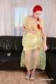 Morrigan - posing in yellow trash bag dress