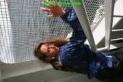 Get a huge package of 1430 pictures with Stella in shiny nylon rainwear from 2005-2008!