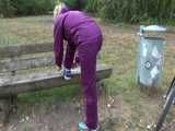 Get a Video with Sandra riding her bike enjoying her shiny nylon Rainwear