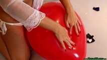 red fingernail popping of seven balloons