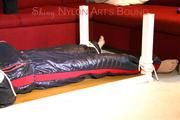 Mara tied and gagged on a bottom-up table wearing a supersexy black/red downwear combination (Pics)
