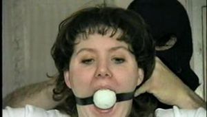 BALL-GAGGED, & TIED BETWEEN  2 PILLARS DAMSEL (D16-12)