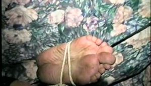 38 Yr OLD CASHIER IS MOUTH STUFFED, WRAP TAPE GAGGED, BAREFOOT & HOG-TIED ON THE SOFA (D51-1)