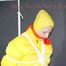 MARA tied and gagged overhead with ropes and a ballgag wearing a super sexy super shiny black rain pants, rubber boots and a yellow down jacket (Pics)