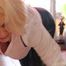 Cara cleans the floor in white shirt and black glossy leggins