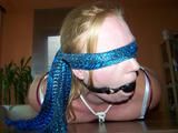 Hogtied on a table 