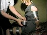 Flight Attendant Wrapped Tied & Gagged with Duct Tape (D22-4)