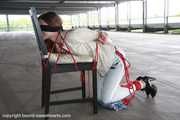 Stella tied hard to chair PICS