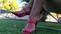pink heels dangling