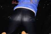 Sexy Sandra wearing a supersexy black shiny nylon rain pants and a sexy shiny blue rain jacket lolling on the sofa (Pics)
