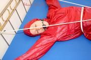A nice cuty hooded, tied and gagged on bed