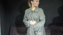 Watching sexy Sandra wearing a supersexy long rainwear skirt trying on several rain coats with hoods (Video)