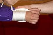 Isabelle tied and gagged in shiny nylon clothes