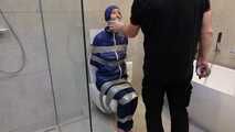 Myxxxy surprised by an Intruder in her Bathroom finally bound and gagged in Rainwear