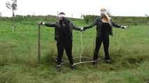 Jasmin & Larissa tied on fence Photoshoot