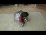 Video with Alina tied and gagged in a shiny pvc sauna suit