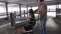 Stella on chair at car park 2/2