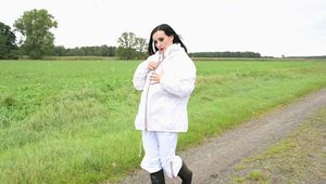 Miss Amira in KWAY rain suit