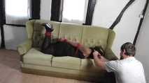 Jasmin hogtied on couch 1/2