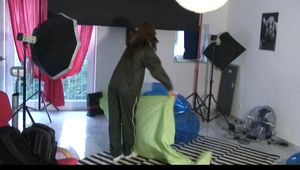 Being at home with Alina wearing shiny nylon rainwear (Video)