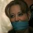 . 41 Yr OLD RED HEADED FAMOUS FASHION MODEL IS OTM GAGGED, BAREFOOT, TOE-TIED, HOPS AROUND ROOM, TIES, GAGS AND HANDCUFFS HERSELF WHILE WEARING BLUE JEANS  PT 8  (D60-5)
