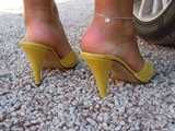 yellow leather mules and tits