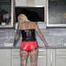 Miss Francine in short nylon sprinter shorts