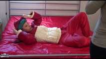 Watching sexy Mara during a photo shooting wearing a sexy red shiny nylon rainpant and an oldschool red/white shiny nylon down jacket posing infront of the camera (Video)