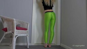 Green leggings in hallway
